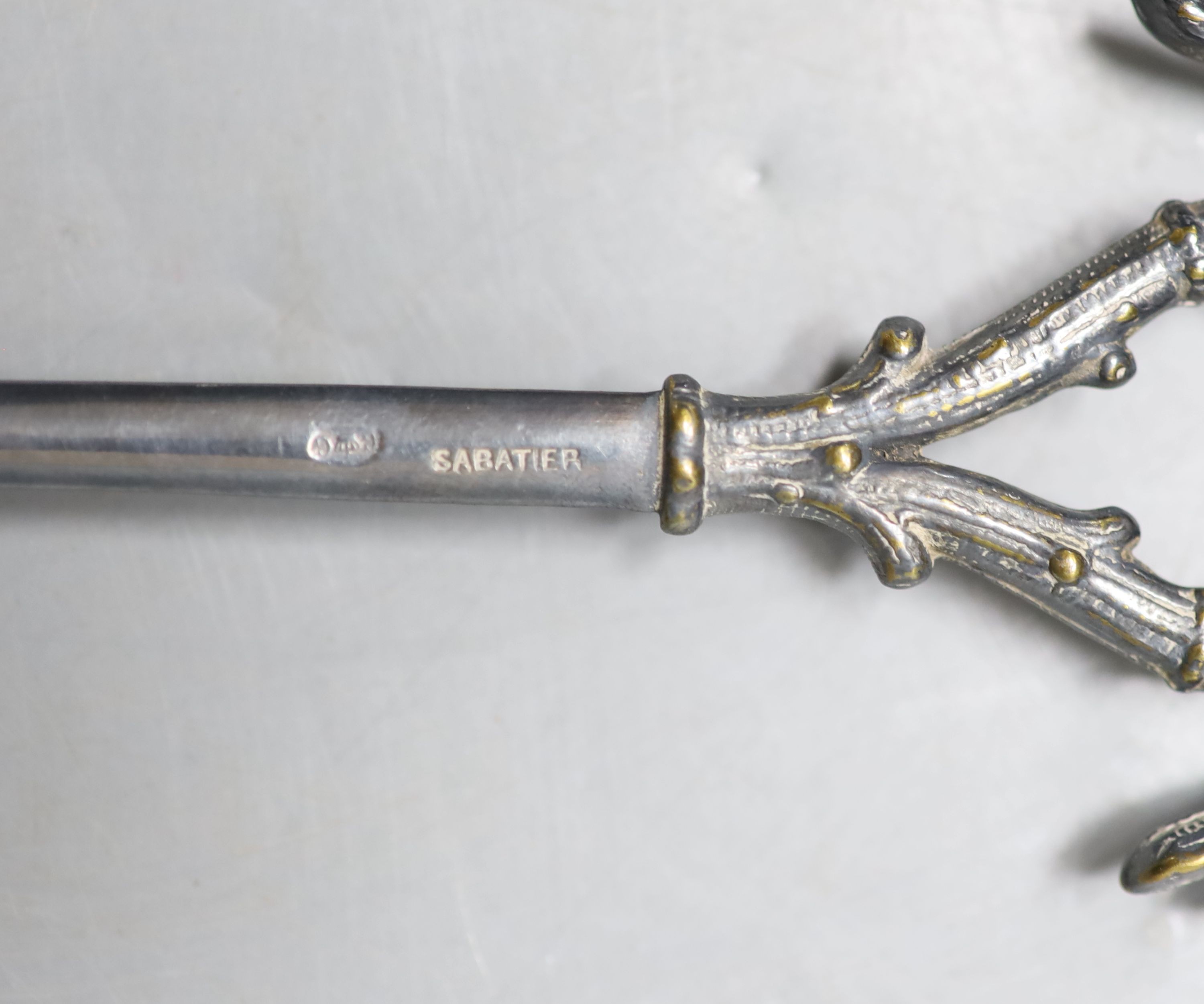 A 19th century French silver plated game skewer by Sabatier, with twin bird terminal, 27cm.